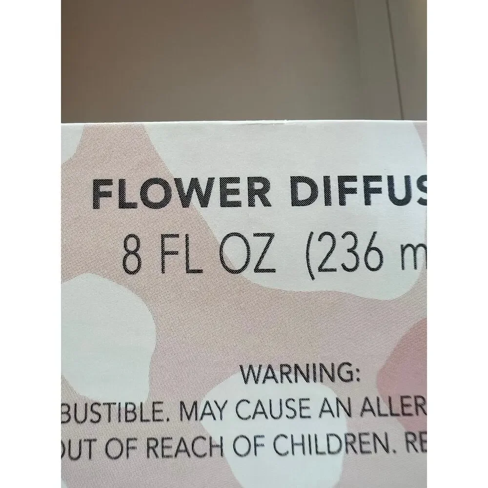 Sweet Grace Diffuser Oil in white vase only. No flower.